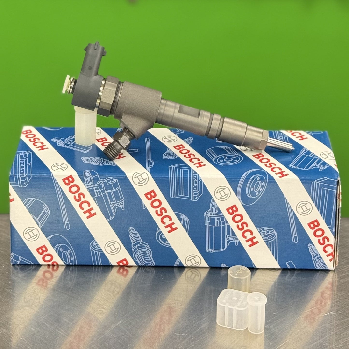 Rear angle view of Bosch 0445110777 fuel injector for Kubota L3301 L3901
