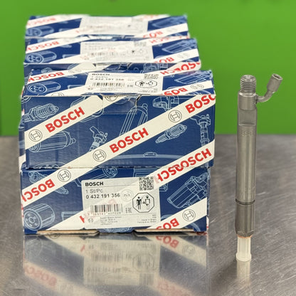 Bosch branded boxes of automotive parts on a reflective surface with a green background