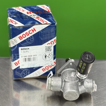 Bosch 0440008089 lift pump showing fuel inlet and outlet ports for diesel system