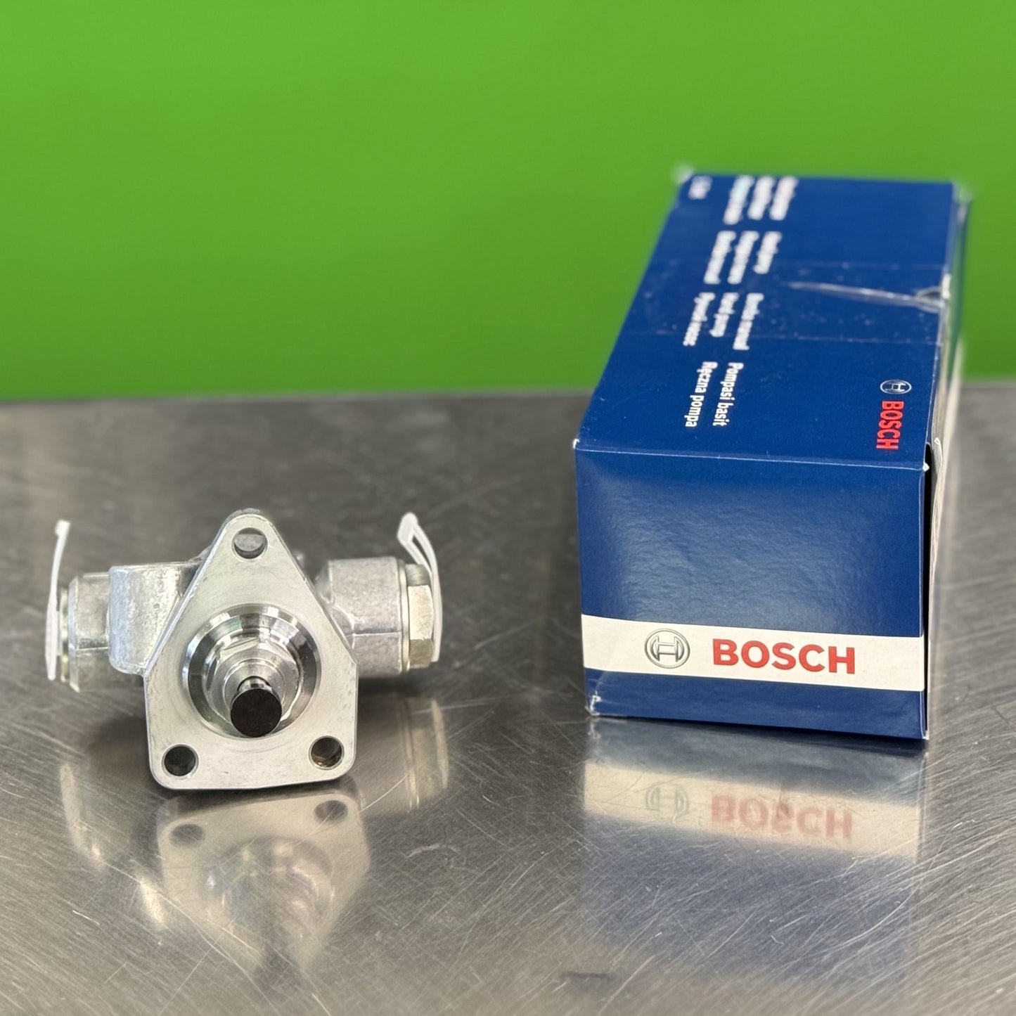 Top view of Bosch 0440008201 fuel supply pump showing connection points and fittings