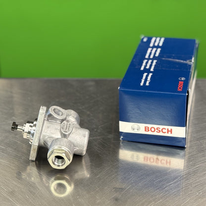 Side view of Bosch 0440008201 diesel fuel supply pump showing housing and mounting bracket