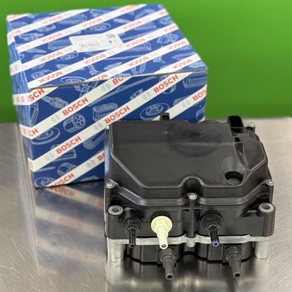 Side view of Bosch 044404227G DEF supply module showing housing and mounting bracket