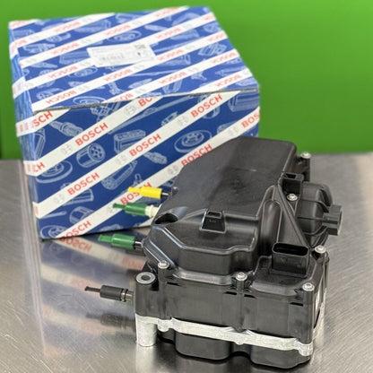 Close-up of Bosch DEF doser pump module 044404227G showing precision housing and fittings