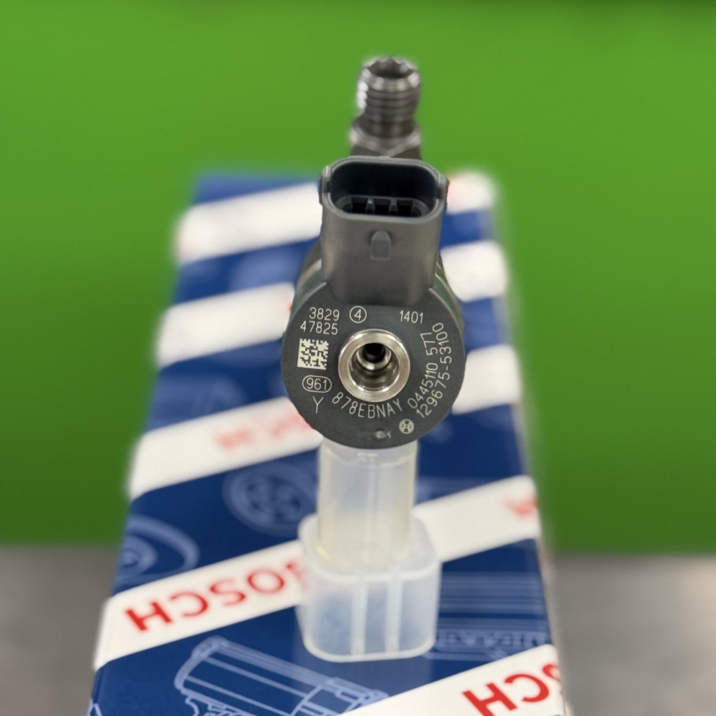 Angled view of Bosch 0445110577 fuel injector for Thermo King application