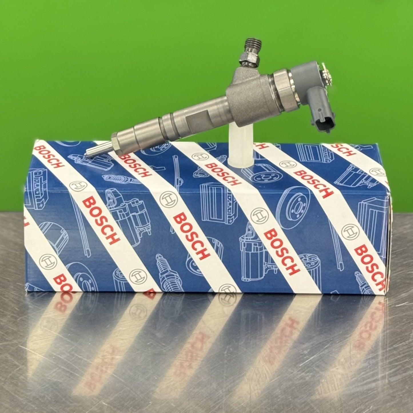 Side view of Bosch 0445110775 diesel fuel injector showing nozzle and body design