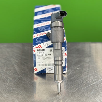 Close-up of Bosch fuel injector nozzle tip 0445110775 for Kubota diesel engine