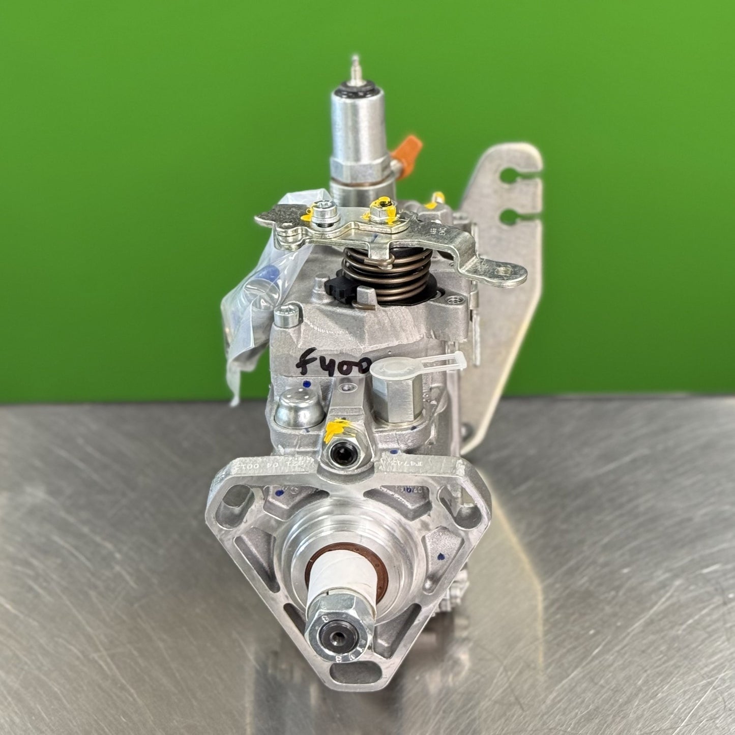 Top view of Bosch 0460423042 injection pump showing fuel ports and mechanical components