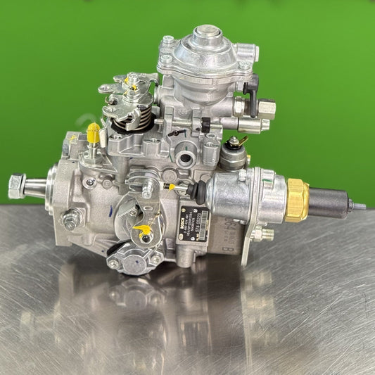 Bosch 0460424491 VE4 fuel injection pump for Case New Holland 3.2L diesel engine front view with mounting bracket