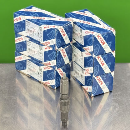 Stacks of Bosch branded boxes on a reflective surface with a green background