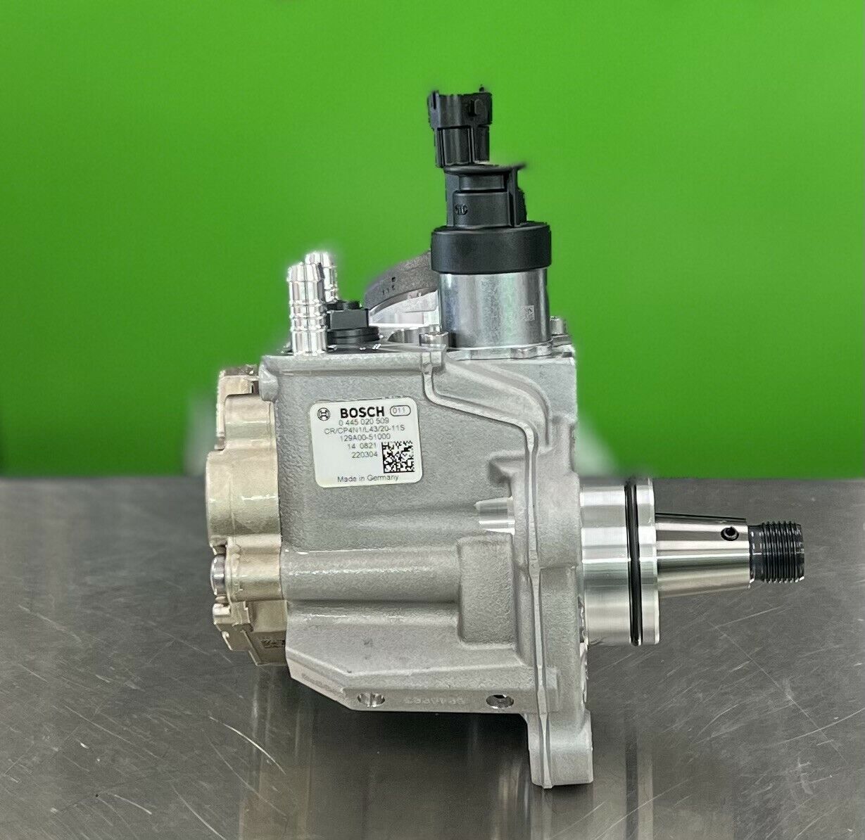 Side view of Bosch 0445020509 fuel injection pump showing housing and mounting design 