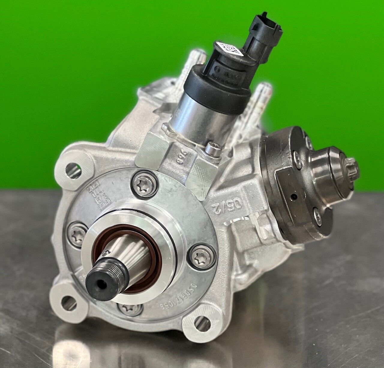 Top view of Bosch 0445020538 high pressure diesel fuel pump showing outlet ports