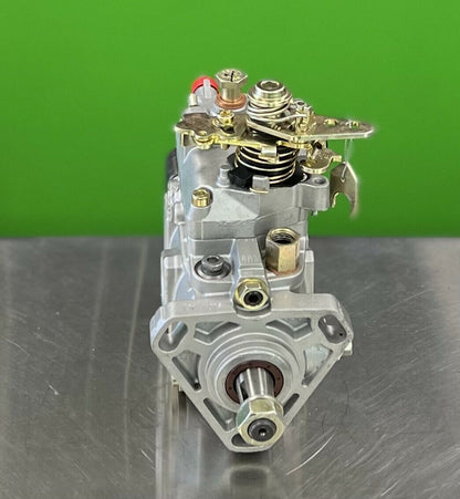 Bosch VE fuel injection pump 0460424081 showing fuel line outlet connections and linkage detail